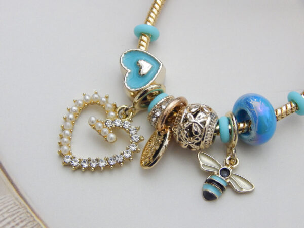 Blue Heart & Bee Charm Bracelet with enamel heart, bee pendant and aqua bead charms on adjustable gold snake chain