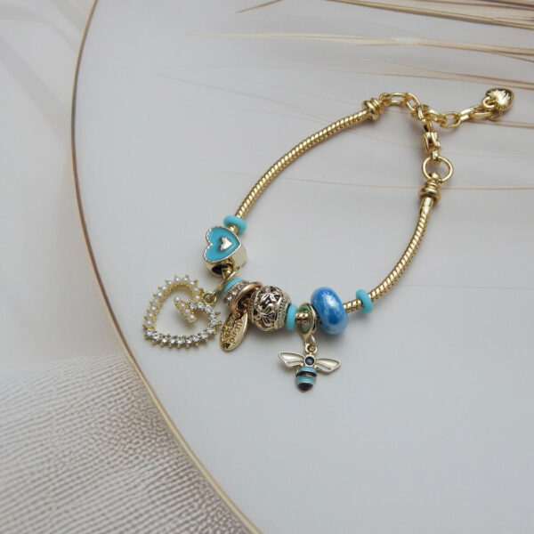 Blue Heart & Bee Charm Bracelet with enamel heart, bee pendant and aqua bead charms on adjustable gold snake chain
