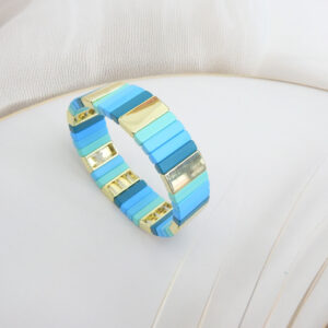 Square tile stretch bracelet in ocean blue and gold tones with gold‑trim