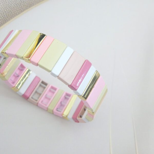 Square tile stretch bracelet in pastel shades (pink/cream/yellow) with gold‑trim