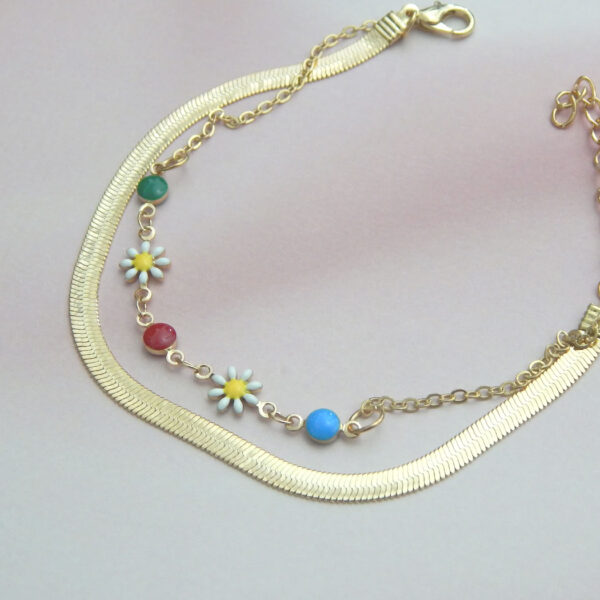Gold chain bracelet with multicolor beads and floral charms