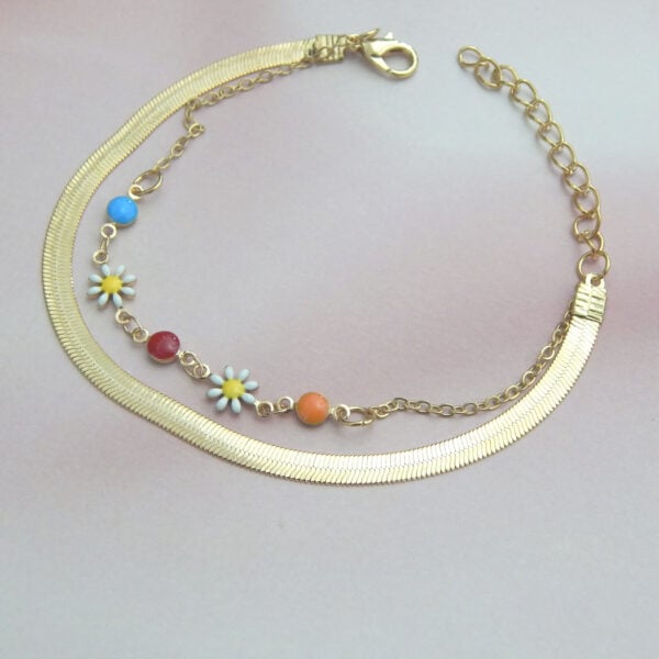 Gold chain bracelet with multicolor beads and floral charms