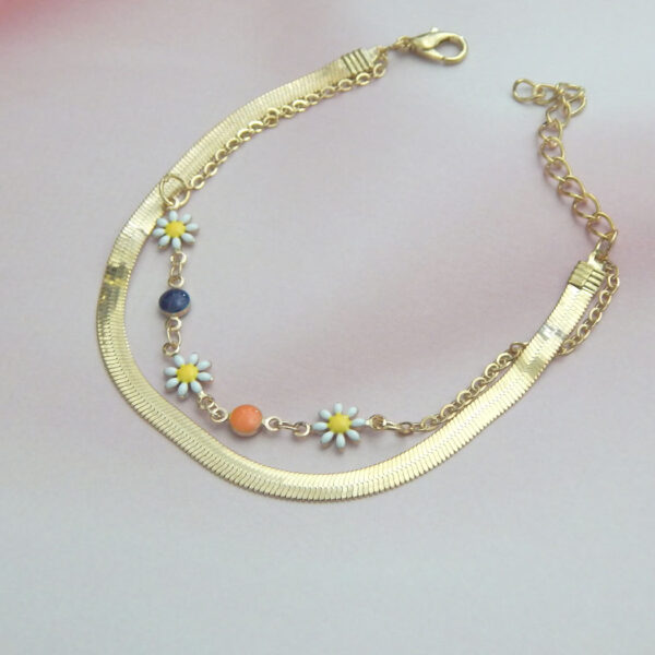 Gold chain bracelet with multicolor beads and floral charms