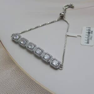 Rectangular halo bracelet in silver finish — six large faceted stones in bold rectangular halos on box chain