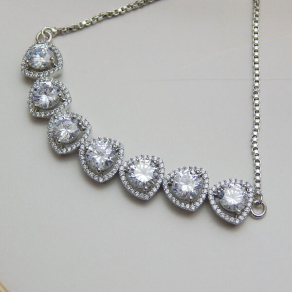 Elegant oval-shaped silver bracelet with dual-stone crystal halos from Royal Reflection DS