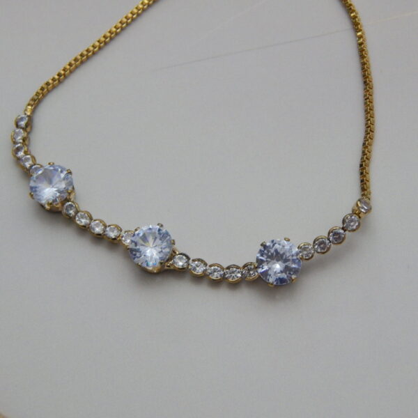 gold-plated triple crystal bracelet with round-cut stones