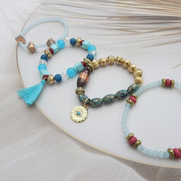 Set of 5 aqua blue, gold and maroon beaded bracelets with tassel and coin charm – Royal Reflection DS