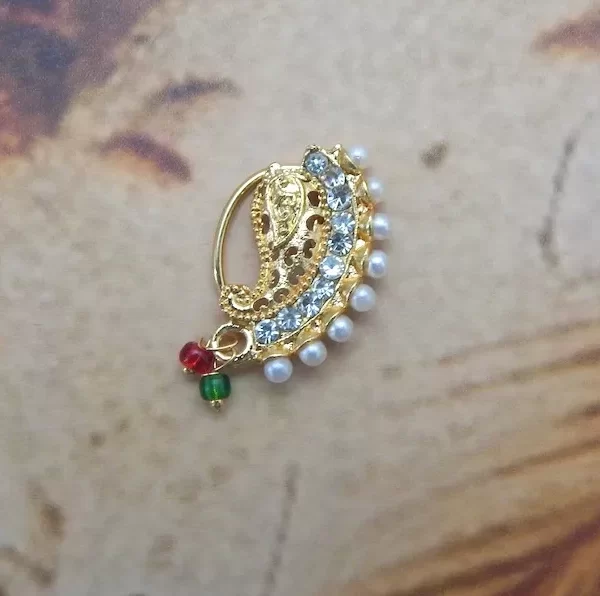 Gold-toned curved Nath with white crystals, pearl fringe, and colorful bead drops under ₹70
