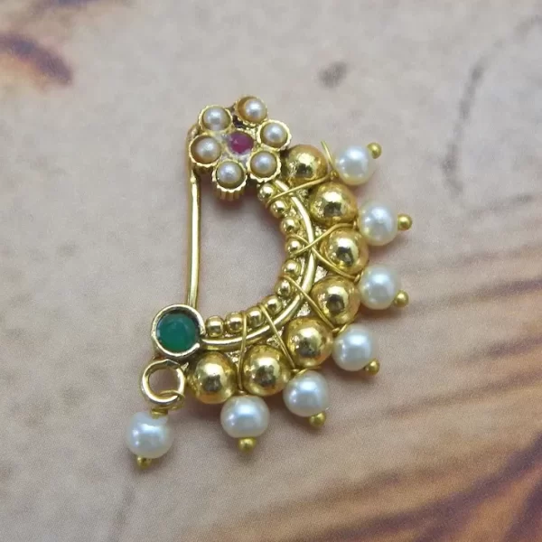 Floral imitation Nath with golden beads, pearl drops, and green stone under ₹70