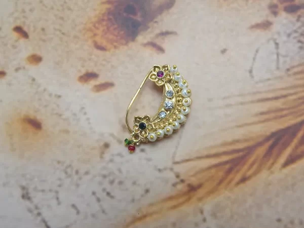 Floral pearl Nath with gold-toned curve and multicolor stones – traditional nose pin under ₹60