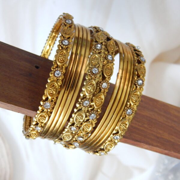 Antique Gold-Toned Bangles with Engraved Motifs and Stone Accents – Royal Reflection DS