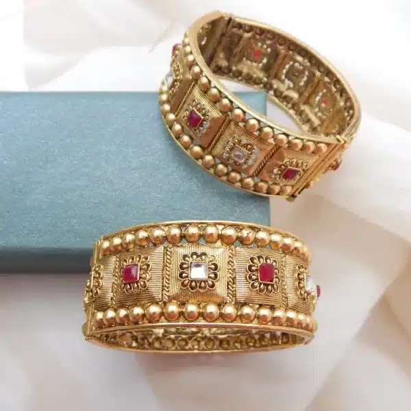 Antique gold beaded kada set with double bead border and ruby Kundan style stones — pair view