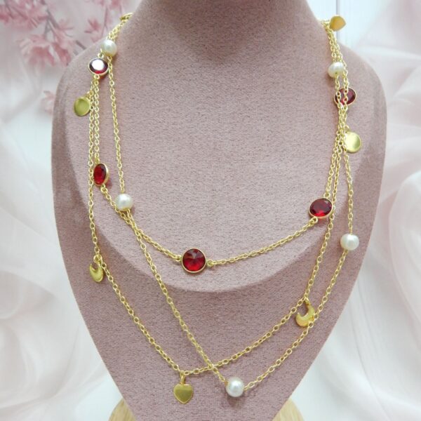 Triple Layer Gold Necklace with Red Stones, Pearls, and Metal Charms – Royal Reflection DS