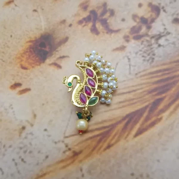Peacock Nath with pink kundan feathers, green enamel eye, pearl bunch, and single drop bead – imitation traditional nose ring for ₹280