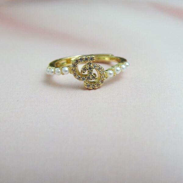 Pearl Edge Adjustable Ring with Crystal Logo Motif and Gold-Tone Finish – Royal Reflection DS