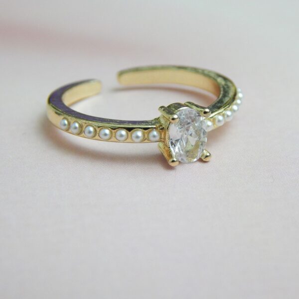 Pearl Lined Adjustable Solitaire Ring with Oval Crystal and Pearl Accent Band – Royal Reflection DS