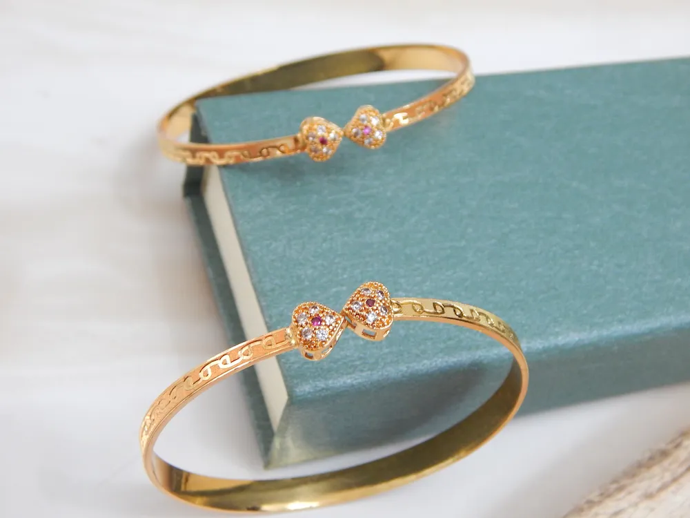 Radiant Heartlink CZ Kada Set with Gold Plating and Dual Heart Design