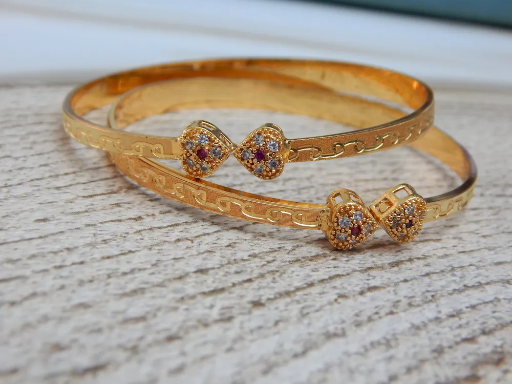 Radiant Heartlink CZ Kada Set with Gold Plating and Dual Heart Design