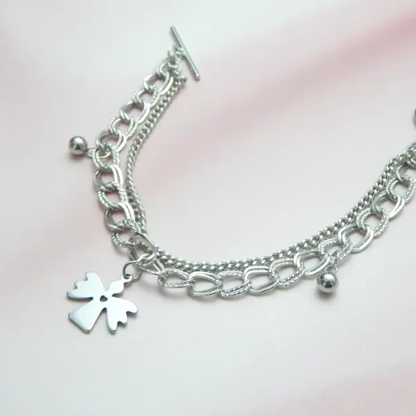 Silver chain bracelet with angel charm for meaningful everyday wear