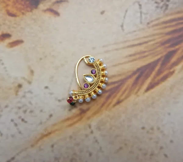 Gold-toned imitation Nath with teardrop stone and pearl border – traditional nose pin under ₹70