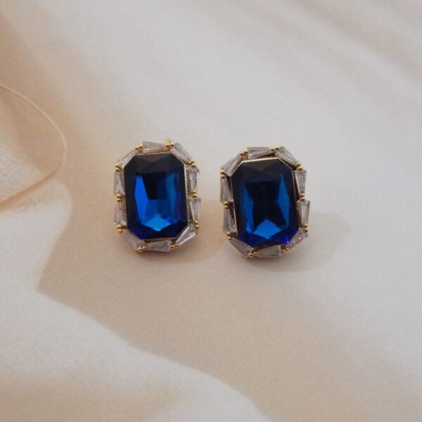 Navratri Royal Blue Jewellery - Royal Reflection DS Brass Emerald-Cut Stud Earrings with Baguette Halo in Deep Blue – Royal Reflection DS