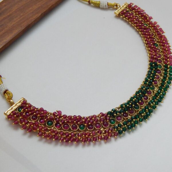Beaded Kundan Necklace Set with Ruby-Green Layered Drops and Matching Earrings – Royal Reflection DS