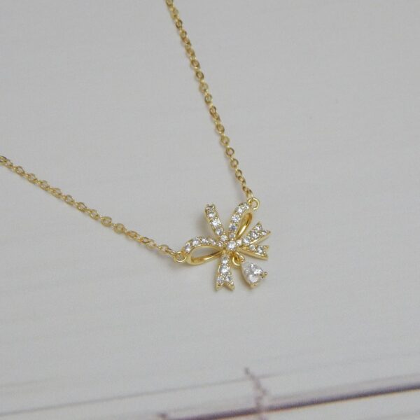 Bow Indulgence Pendant Set – Gold Finish with Matching Earrings – Royal Reflection DS