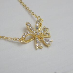 Bow Indulgence Pendant Set – Gold Finish with Matching Earrings – Royal Reflection DS