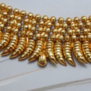 Close-up of Spiral Design Earrings from Classic Gold Set – Royal Reflection DS