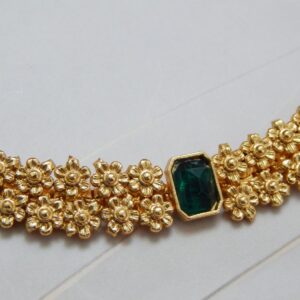 Close-Up of Green Stone and Flower Details on Necklace – Royal Reflection DS