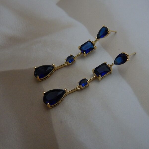 Navratri Royal Blue Jewellery - Royal Reflection DS Navy Blue Variant: Gem Cascade Navy Blue Stone Gold-Plated Dangler Earrings with Teardrop and Geometric Accents – Royal Reflection DS
