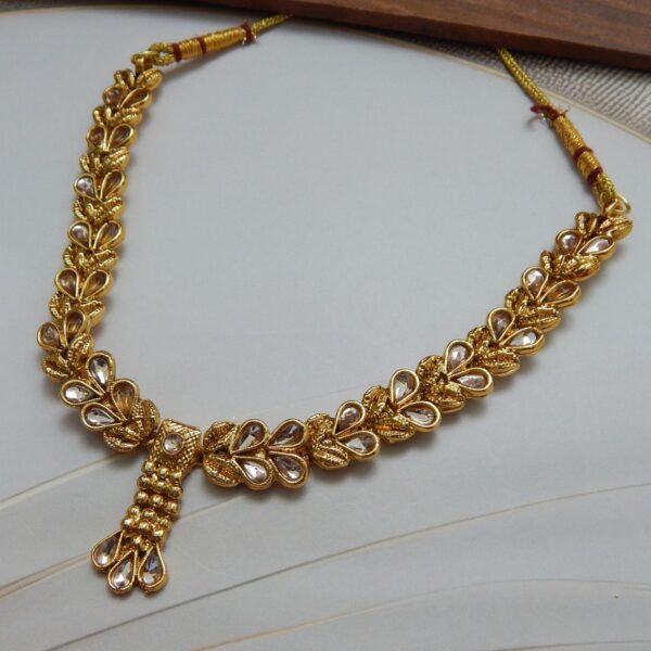 Gleaming Kundan Necklace Set with Leaf Motif – Royal Reflection DS