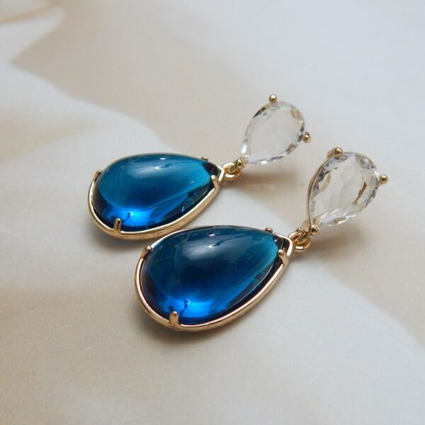 Teardrop Dangle Earrings in Blue Stone with Gold Finish – Royal Reflection DS