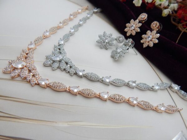 Close-up of Gul Bahar designer floral necklace and earring set with an intricate floral design