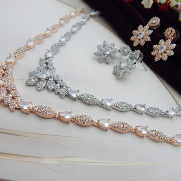 Close-up of Gul Bahar designer floral necklace and earring set with an intricate floral design