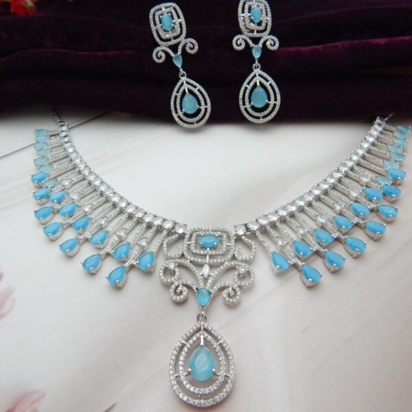 Jeevan blue american diamond fringe necklace set in turquoise with matching earrings