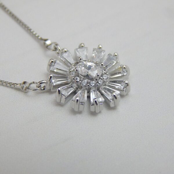 Radiant Bloom Pendant Set in Silver Finish with Sunburst Crystal Design – Royal Reflection DS