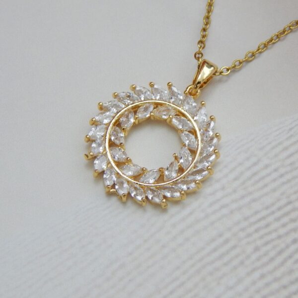 Radiant Halo Gold-Plated Necklace with Marquise CZ Stones – Royal Reflection DS