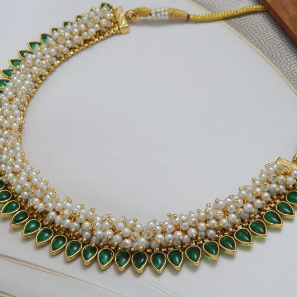 Navratri Green Jewellery - Royal Reflection DS Guttapusalu necklace in Green — emerald teardrop stones on white pearl base