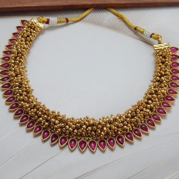 Navratri Red Jewellery - Royal Reflection DS Guttapusalu necklace in Red — ruby red teardrop stones on dense gold bead base