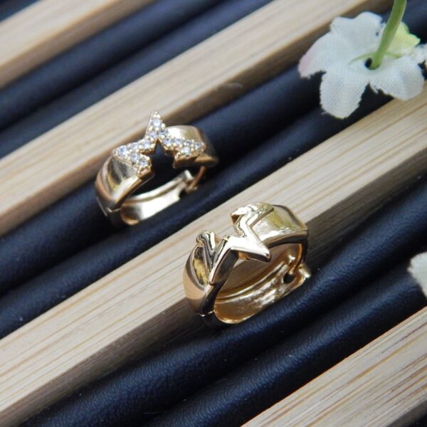 Twinkle Curve Gold-Plated Indian Bali Earrings with Crystal Detailing – Royal Reflection DS