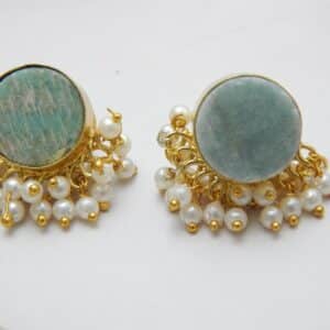 Gold-tone stud earrings with a round, teal/aqua Amazonite stone and a border of dangling white pearl clusters.