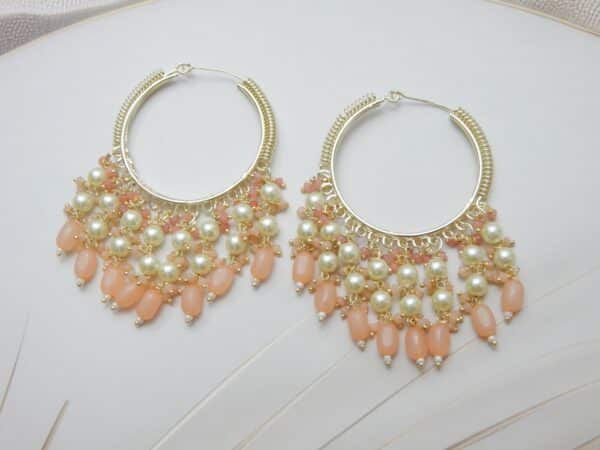 Crystal jhumka hoop earrings with pearl drops in peach and gold tone