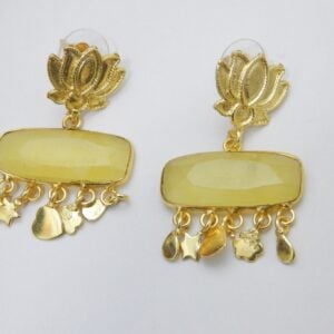 A pair of polished gold-tone earrings with a lotus stud and a horizontal, rectangular yellow stone dangle.