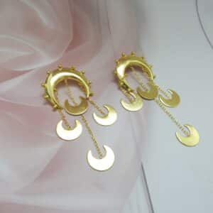 Gold statement crescent moon dangler earrings with chain drops of moon charms