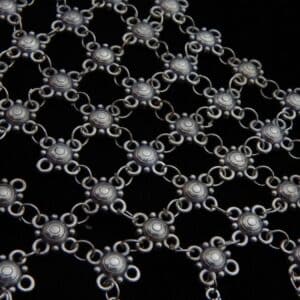 zoom of Wide German Silver choker necklace with mesh/net pattern of small oxidized floral links