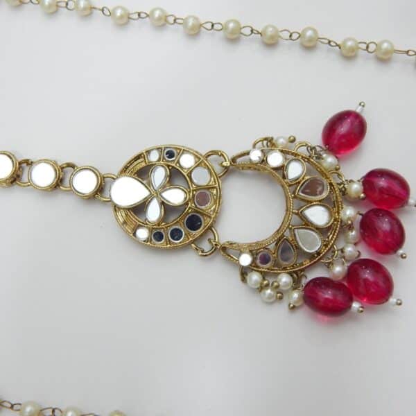 An ethnic mirror work chandbali earring and maang tikka set with beaded drops and small pearls