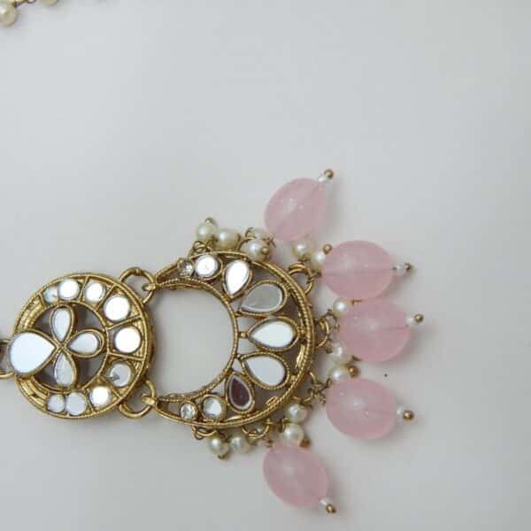 An ethnic mirror work chandbali earring and maang tikka set with beaded drops and small pearls