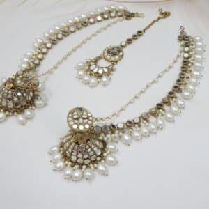 An ethnic mirror work chandbali earring and maang tikka set with beaded drops and small pearls