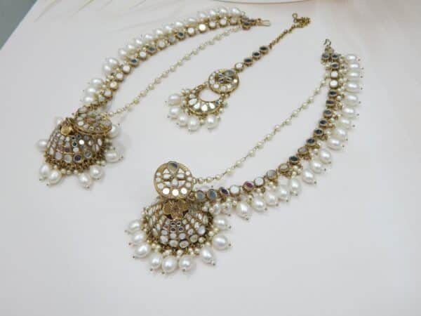 An ethnic mirror work chandbali earring and maang tikka set with beaded drops and small pearls